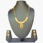 Traditional Gold-Plated Jewelry Set with Intricate Carvings
