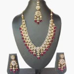 Red Beaded Kundan  Set with Designer Earrings